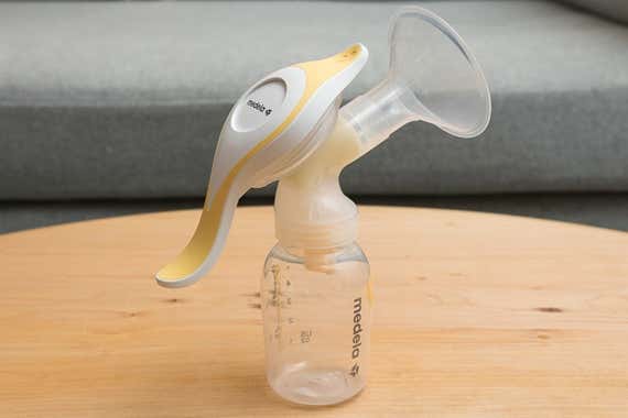 A close-up image of our selection for the best manual breast pump, the Medela Harmony.