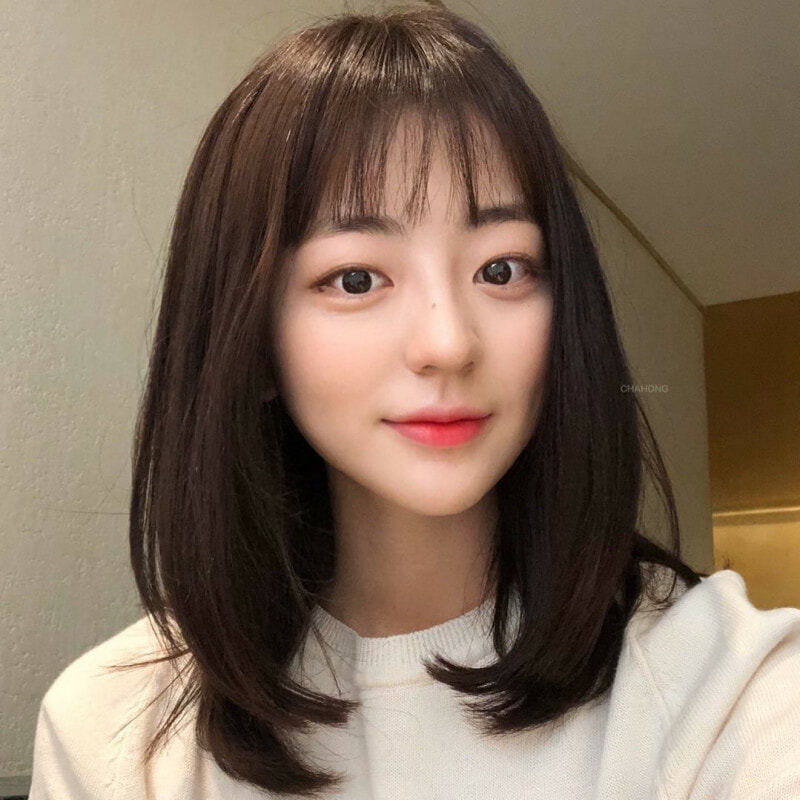 Tóc layer tròn uốn cụp đuôi